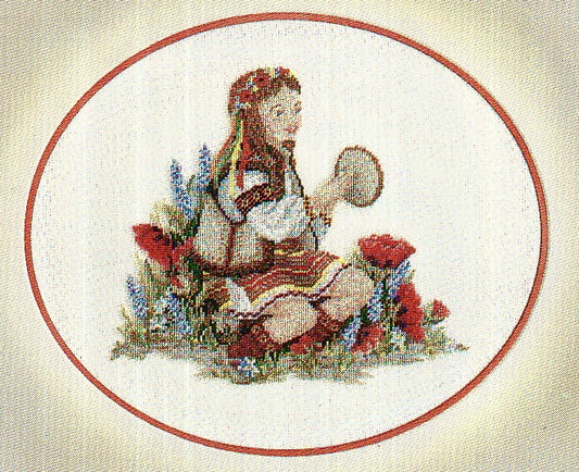 A cross-stitch kit image featuring a woman in a traditional costume playing a drum, with floral patterns in the background.